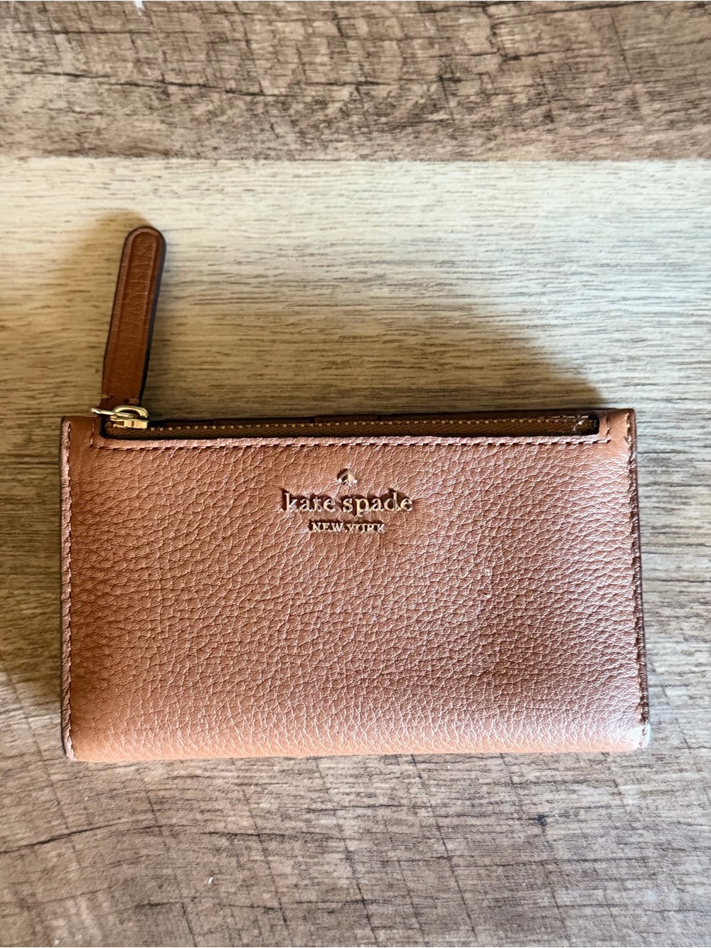 kate spade metallic rose gold pebble leather zip wallet